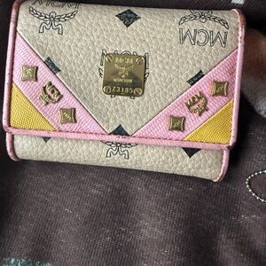 MCM Pink and Yellow Wallet with Textured Finish and Decorative Accents